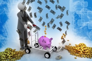 Money entering piggy bank