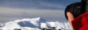 Taking Photo of mountains covered in snow